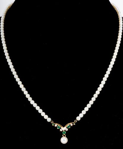 A Pearl Choker with Diamonds and Emeralds