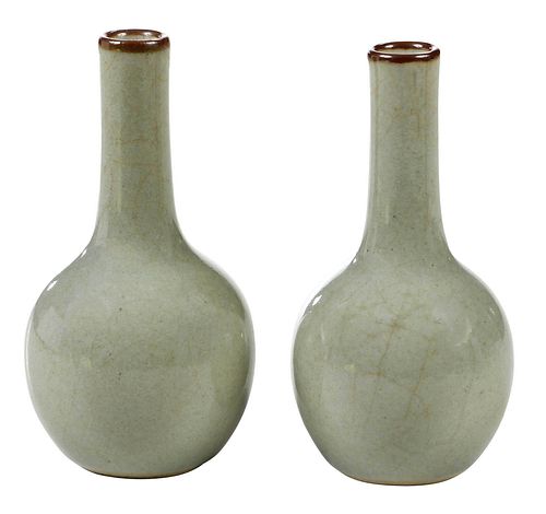 Near Pair of Monochrome Glazed Celadon Bottle Vases
