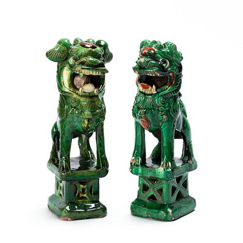 NEAR PAIR, CHINESE GREEN GLAZED GUARDIAN LIONS