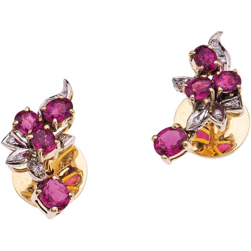 PAIR OF STUD EARRINGS WITH RUBIES AND DIAMONDS IN 14K YELLOW GOLD Oval cut rubies ~1.20 ct, 8x8 cut diamonds~0.05 ct. Weight: 4.7g | PAR DE BROQUELES 