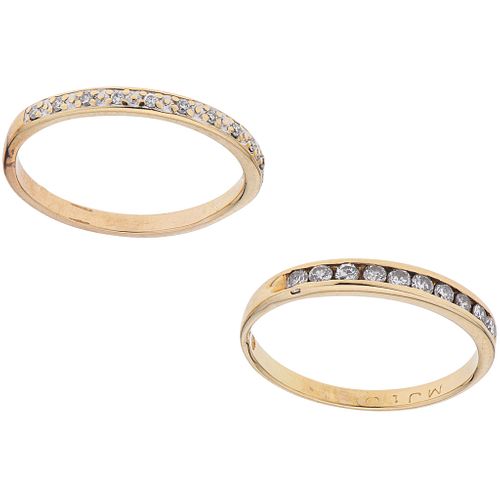 PAIR OF RINGS WITH DIAMONDS IN 10K AND 14K YELLOW GOLD Brilliant cut diamonds ~0.25 ct. Wieght: 2.6 g. Sizes: 5 ¾ and 5 ¼ | PAR DE ANILLOS CON DIAMANT