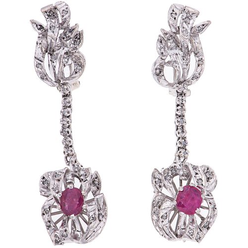 PAIR OF EARRINGS WITH RUBIES AND DIAMONDS IN PALLADIUM SILVER Oval cut rubies ~1.20 ct, 8x8 cut diamonds ~0.60 ct. Weight: 11.7 g | PAR DE ARETES CON 