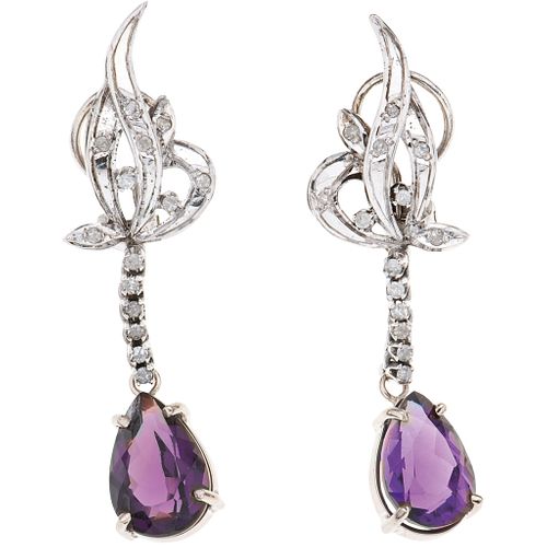 PAIR OF EARRINGS WITH AMETHYSTS AND DIAMONDS IN PALLADIUM SILVER Pear cut amethysts ~5.0 ct, 8x8 cut diamonds ~0.20 ct. Weight: 8.0 g | PAR DE ARETES 
