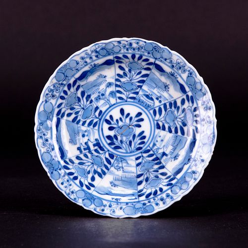 A BLUE AND WHITE LOBED 'FLORAL' DISH, KANGXI MARK 