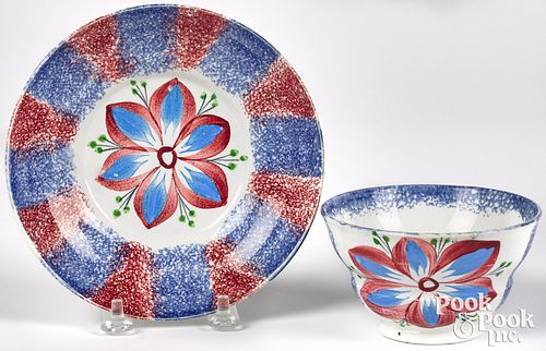 Red and blue spatter dahlia cup and saucer.