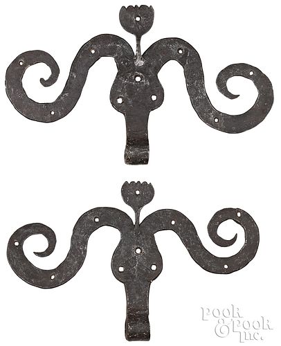 Pair of unusual wrought iron rams horn hinges