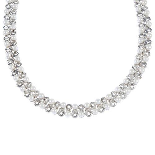 CHANTECLER - a 'capri' cultured pearl and diamond necklace. Designed as a series of scroll links, wi