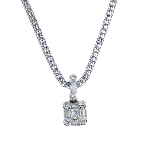 A diamond pendant. The square-shape diamond, within a baguette and brilliant-cut diamond surround, t