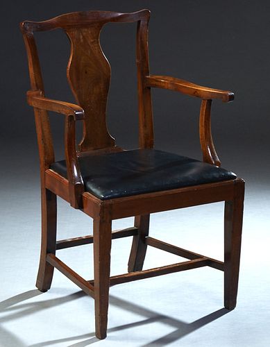 English Georgian Carved Mahogany Chippendale Style Armchair, 19th c., the arched crest rail over a vasiform splat to a blue trapezoidal leather covere