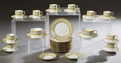 Forty Piece Partial Set of Limoges Porcelain, 20th c., by A. Raynaud, in the "Morning Glory" pattern, with gilt and floral banding, consisting of two 