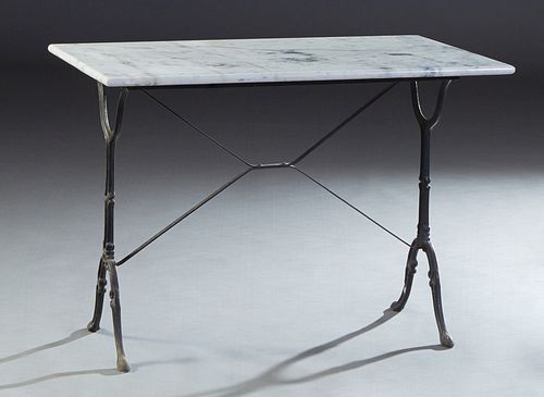 Parisian Marble and Wrought Iron Bistro Table, 20th c., the highly figured rounded edge white rectangular marble top on a long trestle base joined by 