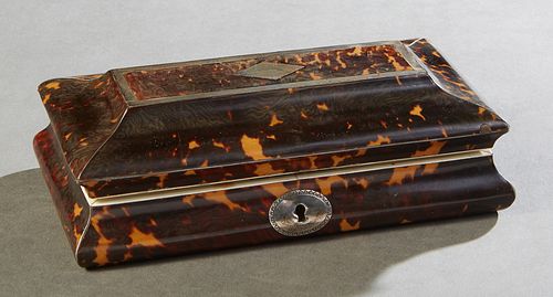 Tortoise Shell Silver Mounted Sewing Box, 19th c., the sloping lid over ogee sides, the interior with a purple silk lining, the interior of the lid fi