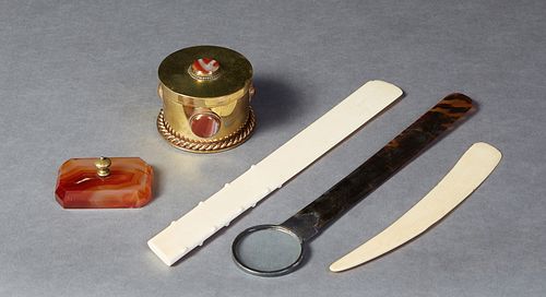 Group of Five Desk Items, 20th c., consisting of a sterling silver mounted magnifying glass tortoise shell letter opener, Birmingham, 1928, with a mak