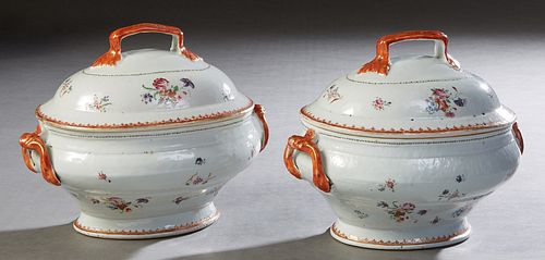 Pair of Chinese Porcelain Famille Rose Covered Tureens, 19th c., with a gilt orange molded handle to the lid, around hand painted floral bouquets and 