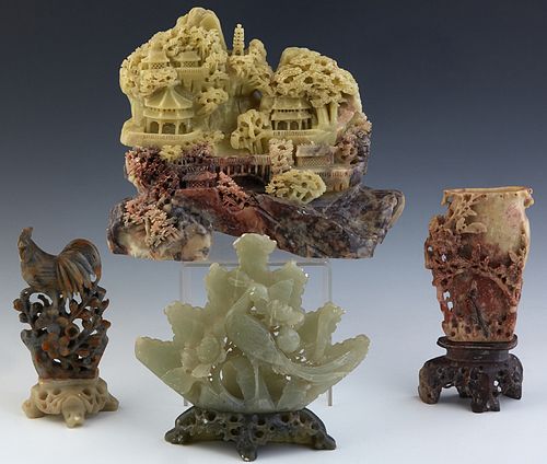 Group of Four Chinese Soapstone Carvings, 20th c., consisting of a bird and flower example on a carved soapstone base, a large landscape carved exampl