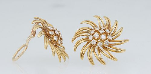 Pair of 14K Yellow Gold Floriform Clip Earrings, 20th c., the center with 12 round .07 point round diamonds, Total Diamond Wt.- 1.68 cts, , H.- 1/4 in