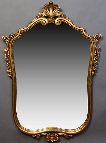 French Louis XV Style Carved Gilt Beech Overmantel Mirror, 20th c., of cartouche form, with a pierced leaf crest, H.- 45 1/2 in., W.- 32 1/2 in., D.- 