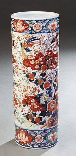 Imari Palette Porcelain Umbrella Stand, 19th c., the cylindrical stand decorated in traditional colors with flowers and foliates, H.- 24 1/2 in., Dia.