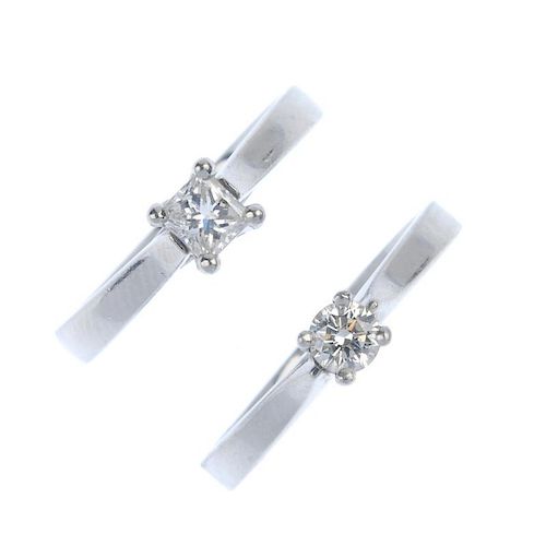 Two platinum diamond single-stone rings. Each designed as a brilliant-cut diamond or square-shape di