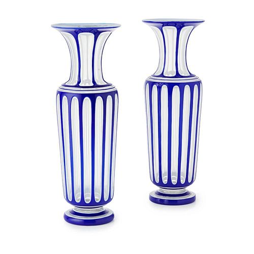A PAIR OF 19TH CENTURY CASED AND OVERLAID GLASS VASES,