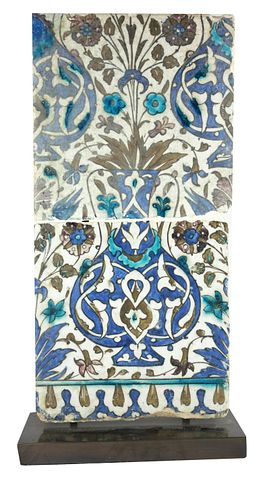 TWO 17TH CENTURY SYRIAN TILES DECORATED WITH A VASE OF