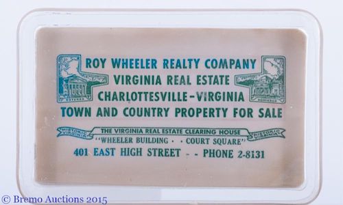 Roy Wheeler Realty Company Glass Paper Weight