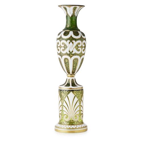 A 19TH CENTURY BOHEMIAN WHITE OVERLAID GLASS VASE AND