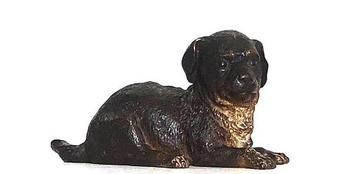 BERGMAN, A LARGE COLD PAINTED BRONZE STATUE OF A PUPPY.