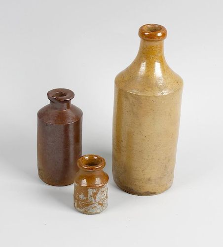 Two boxes containing a large collection of assorted stoneware bottles and jars To include brown ston