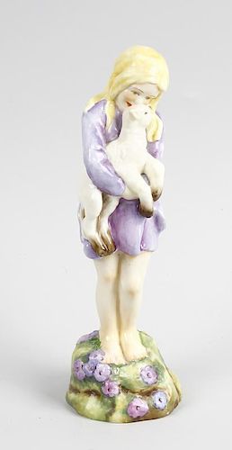 A Worcester figure, 'Spring' 3012 Modelled by F G Doughty. Modelled as a young girl holding a lamb.