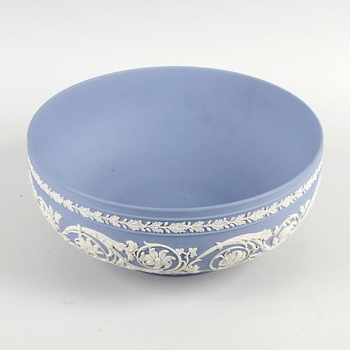 A Wedgwood blue jasperware fruit bowl. Of squat circular form, decoration with a frieze of oak leave