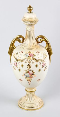 A Crown Devon twin handled vase and cover. Of pear form with slender fluted neck and raised upon a s