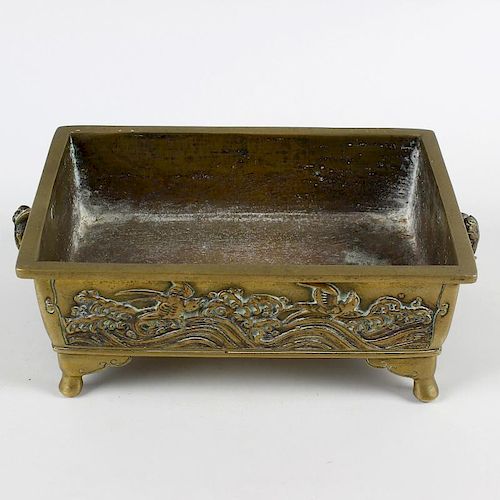 A Japanese bronze bonsai planter. Of rectangular two-handled trough form cast with fish (perhaps koi