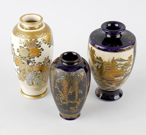 Three Japanese satsuma vases, the first of pear form having continuous scene of females within flora