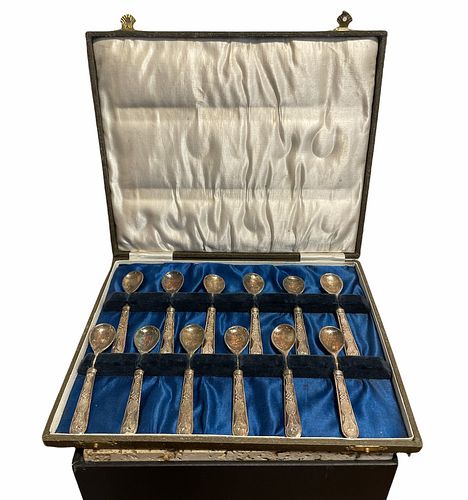 12 German Silver Spoons in a case 