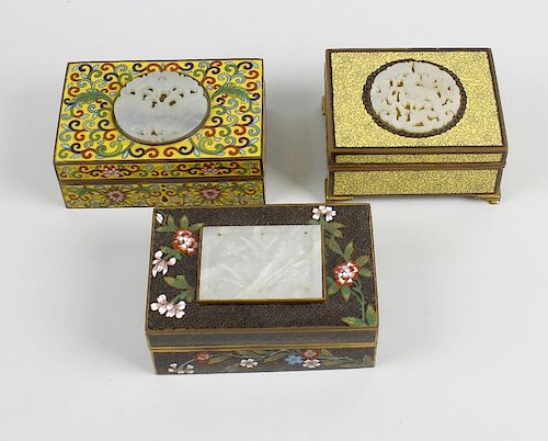 A cloisonne box with jade mounted cover, of rectangular form having foliate wire-work decoration upo