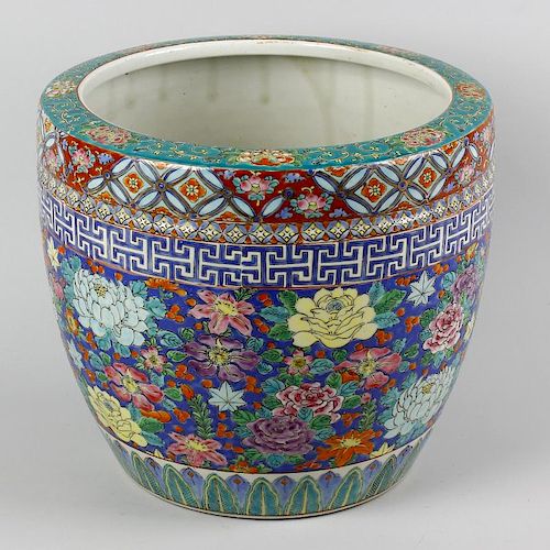 A Chinese Canton famille rose porcelain fish bowl. Of truncated barrel form with flat rim, decorated