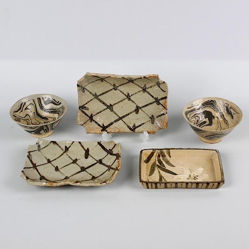 A group of Japanese studio pottery. To include six agate ware bowls, a square serving platter, and t