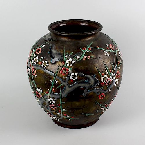A large Japanese enamel on copper vase, of globular form, enamelled in relief with blossoming trees,