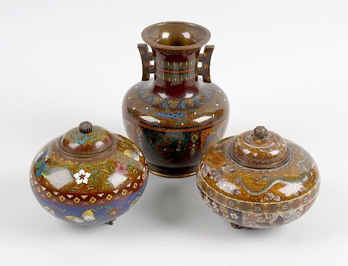 A group of cloisonne wares. Comprising a pair of pots and covers of bulbous form raised upon three s