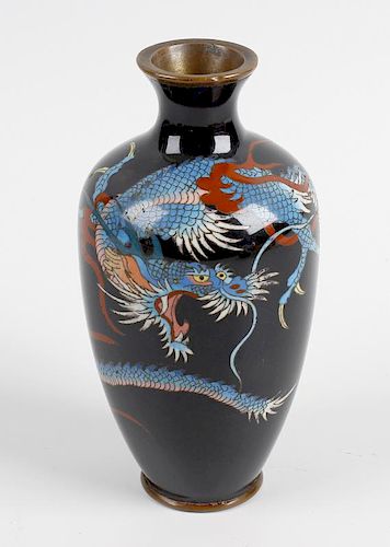 A small cloisonne vase with slender tapered ovoid body finished in a dark blue coloured ground decor