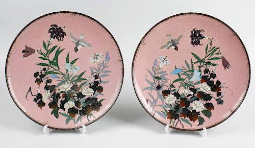 A good pair of cloisonne dishes. Decorated in symmetry with arrangement of flowers and small bird up