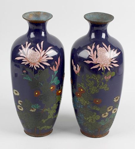 A large pair of cloisonne vases. Of hexagonal sided ovoid form having waisted neck, decorated with p