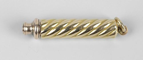 A yellow metal propelling pencil, unmarked, outer sleeve tests as 9ct, with spirally-reeded body to