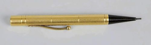 A Watermans 18ct gold propelling pencil, the cylindrical barrel with alternating plain and chequered