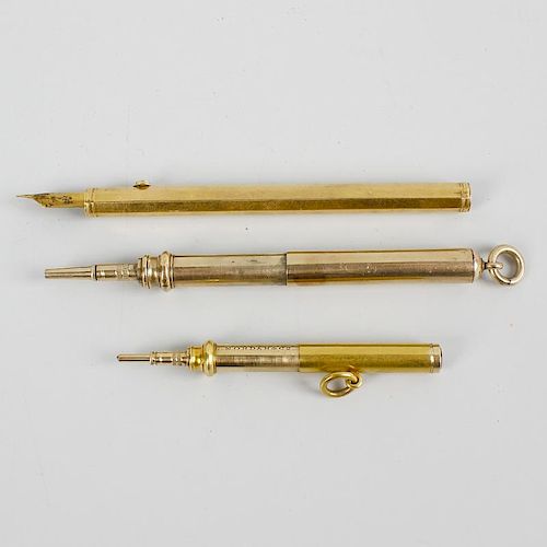 Two yellow metal Sampson Mordan & Co. retractable pencils, each of plain telescopic form, each unmar