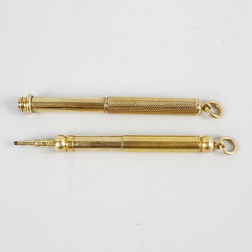 Two Sampson Mordan & Co. yellow metal retractable pencils. The first of plain telescopic form with e
