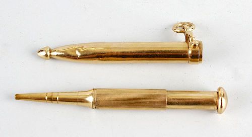 A Sampson Mordan & Co. 9ct gold propelling pencil, the ribbed barrel with domed terminal, within pro