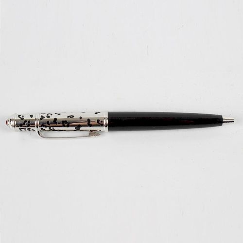 A Cartier ballpoint pen, the black resin lower body with pierced silvered cap, 4.52 (11.5cm) long, i