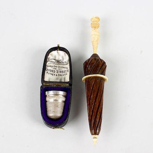 Two sewing-related items. Comprising a silver thimble, 'JAMES WALKER WISHES YOU LUCK', Birmingham, 1